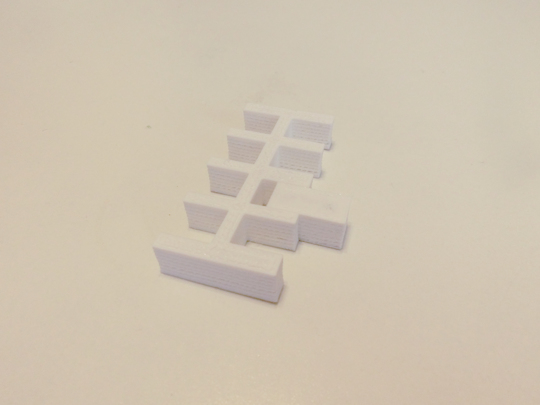 3D printed notches that differ in size by micrometers.